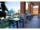 Relaxing covered outdoor dining space overlooking a water park at 2652 Corvette Ln, Kissimmee, FL 34746
