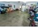 Large garage offering ample space for parking, storage, and various activities, with room for vehicles and equipment at 2822 Moultrie Creek Dr, Kissimmee, FL 34743
