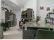 Modern kitchen with granite countertops, tile backsplash, stainless steel appliances, and a breakfast bar at 2822 Moultrie Creek Dr, Kissimmee, FL 34743