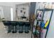 Kitchen and breakfast bar with granite countertops and open view to living room at 2822 Moultrie Creek Dr, Kissimmee, FL 34743