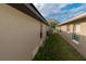 Side yard between two homes with a strip of grass and view of the neighborhood at 2822 Moultrie Creek Dr, Kissimmee, FL 34743