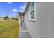 Features a well-maintained exterior with porch at 3139 Morning Light Way, Kissimmee, FL 34744