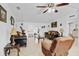 Comfortable living room features tile floors and tasteful decor at 3139 Morning Light Way, Kissimmee, FL 34744