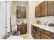 Pantry featuring upper and lower cabinets and a white countertop at 3139 Morning Light Way, Kissimmee, FL 34744