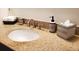 Bathroom features a granite counter with neutral colors and stylish decor accents at 3214 Candle Ridge Dr # 201, Orlando, FL 32822