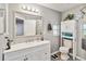 Well-lit bathroom with a double vanity and new fixtures at 3260 Osceola Rd, St Cloud, FL 34772