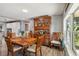 Formal dining room with wood furniture and window providing natural light at 3260 Osceola Rd, St Cloud, FL 34772
