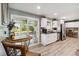 Bright kitchen featuring stainless steel appliances and sliding glass doors to the outdoor patio at 3260 Osceola Rd, St Cloud, FL 34772