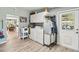Well-equipped laundry room with a sink, washer, dryer, storage, and access to the backyard at 3260 Osceola Rd, St Cloud, FL 34772