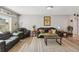 Inviting living room with a comfortable sofa, area rug, and neutral color palette at 3260 Osceola Rd, St Cloud, FL 34772
