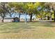 Extensive property view, featuring trees and metal buildings, providing ample outdoor space at 3260 Osceola Rd, St Cloud, FL 34772