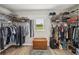 Large walk-in closet with custom shelving and plenty of storage space at 3260 Osceola Rd, St Cloud, FL 34772