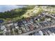 This aerial view highlights the property's proximity to a lake, park, and golf course at 3317 Schoolhouse Rd, Harmony, FL 34773