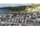 Aerial view showcases the home's location within a picturesque lakeside community at 3317 Schoolhouse Rd, Harmony, FL 34773