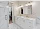 Contemporary bathroom featuring a double vanity, glass shower, and modern fixtures at 3317 Schoolhouse Rd, Harmony, FL 34773