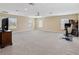 Spacious bonus room features neutral carpet, ample natural light, and versatile open layout at 3317 Schoolhouse Rd, Harmony, FL 34773