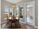 Bright dining room with large windows and a view to the backyard at 3317 Schoolhouse Rd, Harmony, FL 34773