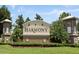 The 'Harmony' community entrance sign with manicured landscaping and decorative towers at 3317 Schoolhouse Rd, Harmony, FL 34773