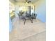 Screened patio with patio furniture perfect for relaxing and entertaining, ceiling fan, and neutral paint at 334 Sonja Cir, Davenport, FL 33897