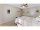 Bedroom featuring a ceiling fan, neutral carpet, and light-colored walls at 3384 Cordgrass Pl, Harmony, FL 34773
