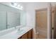 Well-lit bathroom with ample counter space, cabinets, and a shower/tub combination provides a functional and clean space at 3818 Carrick Bend Dr, Kissimmee, FL 34746