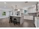 Bright kitchen with an island, stainless steel appliances, and open layout great for entertaining at 415 S 9Th St, Leesburg, FL 34748