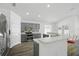 Modern kitchen featuring stainless steel appliances and breakfast bar at 4411 Great Harbor Ln, Kissimmee, FL 34746
