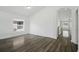 Living room featuring hard surface floors, neutral wall color and windows allowing natural light at 4411 Great Harbor Ln, Kissimmee, FL 34746