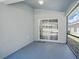 This light-filled screened patio has a view of the backyard at 4411 Great Harbor Ln, Kissimmee, FL 34746