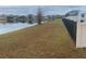 A view of the backyard showing the lake behind the house at 4653 Marcos Cir, Kissimmee, FL 34758