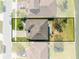 Aerial view of a home and its property, highlighting the layout and surrounding area at 4842 Rockvale Dr, Kissimmee, FL 34758