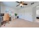 Versatile bedroom with a workspace, including a desk, chair, and decor at 4842 Rockvale Dr, Kissimmee, FL 34758