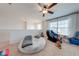 Upstairs loft space featuring a ceiling fan, lots of light and a modern massage chair at 4842 Rockvale Dr, Kissimmee, FL 34758