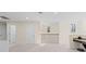 Bright upstairs living area with carpeting, natural light, and stylish chandelier at 5201 Lake Hinden Cv, St Cloud, FL 34771