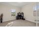 Bright office space featuring tile flooring, built-in desk, and natural light from a window at 5201 Lake Hinden Cv, St Cloud, FL 34771