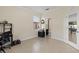 Additional view of the bright office with tile flooring and a convenient desk setup at 5201 Lake Hinden Cv, St Cloud, FL 34771
