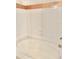 Clean, tiled bathtub with modern fixtures at 619 Terrace Ridge Cir # 619, Davenport, FL 33896