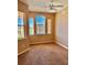 Cozy bedroom featuring a ceiling fan and big windows at 619 Terrace Ridge Cir # 619, Davenport, FL 33896