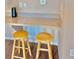Eat in bar with two wooden stools at 619 Terrace Ridge Cir # 619, Davenport, FL 33896