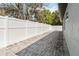 Backyard view featuring a privacy fence and paver stones at 6592 Taxiway Cir, Orlando, FL 32822