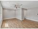 Bright bedroom featuring tile flooring, neutral walls, recessed lighting, and a ceiling fan at 6592 Taxiway Cir, Orlando, FL 32822