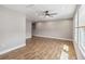 Bonus room featuring tile flooring, neutral walls, recessed lighting, a ceiling fan and many windows at 6592 Taxiway Cir, Orlando, FL 32822