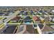 Aerial view of neighborhood showing fenced yards, pools, solar panels and quiet, walkable streets at 669 Persian Dr, Haines City, FL 33844