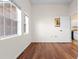 An airy bedroom with hardwood floors and natural light at 673 Leland Dr, Deltona, FL 32725