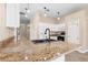 Kitchen island featuring granite countertops and a modern black sink and faucet at 673 Leland Dr, Deltona, FL 32725
