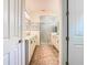 Bright primary bathroom with double sinks, vanities, and a glass door walk-in shower at 759 Villa Park Rd, Poinciana, FL 34759