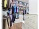 Walk-in closet with clothing racks, shelves, drawers and storage at 759 Villa Park Rd, Poinciana, FL 34759