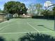 Outdoor basketball court with well-maintained surface, ideal for sports and recreation at 7794 Indian Ridge S Trl, Kissimmee, FL 34747
