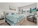 Inviting primary bedroom with serene decor, plush bedding, and natural light at 840 Luarca Ln, Oviedo, FL 32765