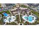 Aerial view of community clubhouse, splash pool, and other amenities at 8968 Amelia Downs Trl, Kissimmee, FL 34747